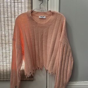 Double Zero Sweater. Over-sized fringe cut. Light coral.